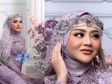 Inilah potret Jenita Janet saat mengenakan gaun pernikahan yang terlihat menawan. Istri Danu Sofwan terlihat cantik paripurna saat mengenakan long dress bertabur bunga. Meski mengenakan gaun berbahan tulle yang transparan, Jenita Janet mengenakan rancangan gaun yang bisa membuatnya tampil syar`i. (Liputan6.com/IG/@jenitajanet).