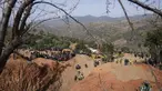 Warga menyaksikan petugas berusaha menyelamatkan bocah lelaki berusia 5 tahun yang jatuh ke dalam sumur di dekat kota Bab Berred dekat Chefchaouen, Maroko (4/2/2022). Bocah itu, yang diidentifikasi sebagai Rayan, jatuh ke dalam sumur sedalam 32 meter (105 kaki). (AP Photo/Mosa'ab Elshamy)
