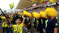 Aksi heboh fans Valentino Rossi di Sirkuit Sepang (Liputan6.com/Defri Saefullah)