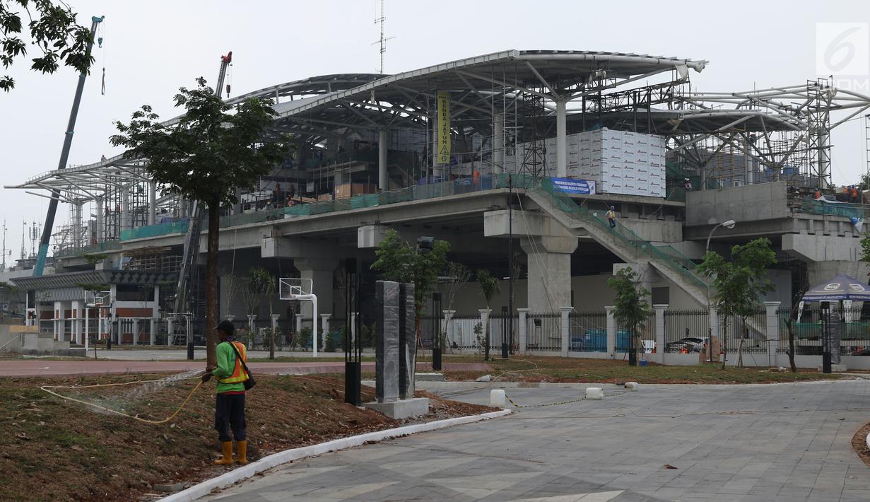 Suasana pembangunan Stasiun kereta LRT Velodrome Rawamangun, Jakarta, Selasa (17/7). LRT fase 1 rute Kelapa Gading-Velodrome Rawamangun sepanjang 5,8 kilometer ditargetkan selesai jelang pelaksanaan Asian Games 2018. (Liputan6.com/Helmi Fithriansyah)