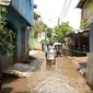 Hujan yang terus menerus mengguyur Jakarta, membuat beberapa titik terkena banjir. 