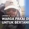 Warga Pakai Drone untuk Bertani