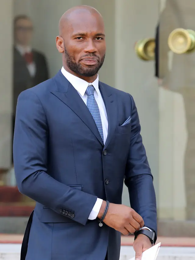 Gaya Didier Drogba Saat Diundang Makan Siang Presiden Liberia dan Prancis