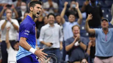 Petenis Serbia, Novak Djokovic bereaksi setelah memenangkan perempat final AS Terbuka 2021 melawan Matteo Berrettini dari Italia di Arthur Ashes Stadium, New York, Kamis (9/9/2021). Petenis nomor satu dunia itu melaju ke semifinal usai menang 5-7, 6-2, 6-2, 6-3. (Ed JONES/AFP)