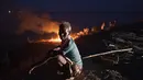 Gelombang panas menyengat di dua negara bagian terpadat di India. (AP Photo/Rajesh Kumar Singh)