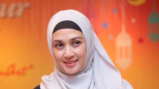 Dina lorenza mualaf