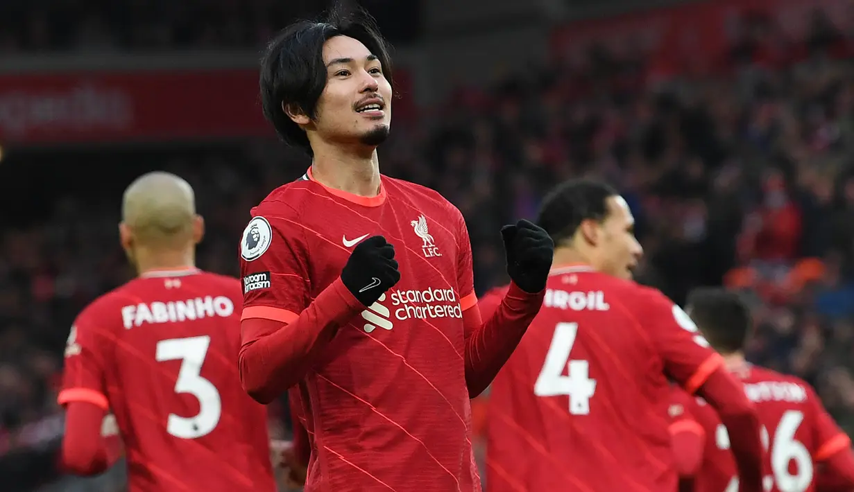 Takumi Minamino. Pemain sayap Jepang berusia 27 tahun yang telah 3 musim berseragam Liverpool ini tampil 4 kali di Carabao Cup musim 2021/2022 hingga semifinal leg pertama. Meski tidak diturunkan di laga final, sumbangan 4 gol dan 1 assistnya telah membuka jalan mulus bagi The Reds. (AFP/Paul Elis)