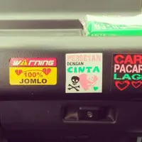 Sticker angkot terkadang menggelitik para penumpang. Pernah lihat, nggak?