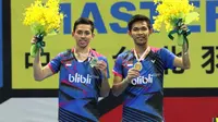 Ganda putra Indonesia, Fajar Alfian/Muhammad Rian Ardianto, berpose di podium usai menjuarai Taiwan Masters Grand Prix 2016, Minggu (16/10/2016). (PBSI)