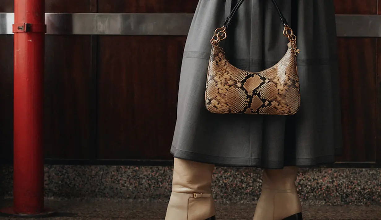 Koleksi ini menginterpretasikan kembali kemewahan dan sportswear Amerika yang diterjemahkan lewat gaya klasik kota New York. (Foto: Tory Burch)