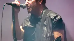 Trent Reznor dari Nine Inch Nails tampil pada hari ketiga Riot Fest 2022 di Douglass Park, Chicago, Amerika Serikat, 18 September 2022. (Photo by Rob Grabowski/Invision/AP)