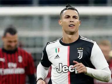 Pemain Juventus Cristiano Ronaldo usai mencetak gol penalti ke gawang AC Milan pada pertandingan Coppa Italia di Stadion San Siro, Milan, Italia, Kamis (13/2/2020). Pertandingan berakhir 1-1. (AP Photo/Antonio Calanni)