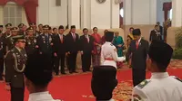 Presiden Jokowi mengukuhkan 68 anggota Paskibraka di Istana Negara. (Liputan6.com/Hanz Salim)