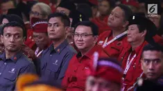 Mantan Gubernur DKI Jakarta Basuki Tjahaja Purnama atau Ahok saat menghadiri Kongres V PDIP di Denpasar, Bali, Kamis (8/8/2019). Ahok mengenakan kemeja merah berloga PDIP. (Liputan6.com/JohanTallo)