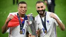 Prancis menjadi kampiun UEFA Nations League 2021 usai membungkam Spanyol 2-1 dalam laga final, Sabtu (10/10/2021). Tercatat ada 5 pemain kunci yang tampil apik dan akhirnya memukul balik Spanyol yang sempat unggul satu gol lebih dahulu. Simak ulasannya. (AFP/Franck Fife)