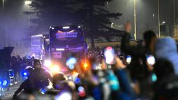 Kepulangan timnas Argentina disambut meriah oleh masyarakat di Ezeiza, Buenos Aires. (Luis ROBAYO/AFP)