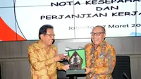 Menteri ATR/BPN, Sofyan A. Djalil dan Direktur Utama BPJS Ketenagakerjaan, Agus Susanto saat prosesi penandatanganan perjanjian kerjasama untuk memberikan perlindungan sosial bagi seluruh pekerja.