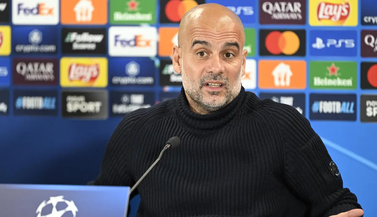 Pelatih Manchester City, Pep Guardiola tetap percaya diri meski badai cedera menghantui timnya. (STR/AFP)