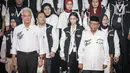 Pasangan calon presiden dan wakil presiden 2024 dengan nomor urut 3, Ganjar Pranowo-Mahfud MD sesaat sebelum acara debat perdana Calon Presiden pada Pilpres 2024. (Liputan6.com/Faizal Fanani)