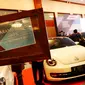 Sejumlah mobil hasil rampasan KPK yang dipajang dalam Lelang Expo 2017 di Jakarta Convention Center, Jumat (22/9).Tidak hanya barang sitaan, sejumlah barang hasil pelaporan gratifikasi ke KPK juga dilelang dalam acara itu. (Liputan6.com/Angga Yuniar)