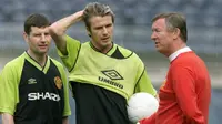 David Beckham dan Alex Ferguson (PATRICK HERTZOG / AFP)