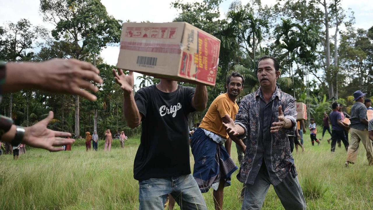 FOTO: Bantuan Udara Dikebut untuk Warga Terdampak Banjir di Aceh