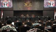 Suasana sidang perdana sengketa Pemilu Legislatif 2019 di Gedung Mahkamah Konstitusi (MK), Jakarta, Selasa (9/7/2019). Sidang perdana kali ini berisi pemeriksaan pendahuluan. (merdeka.com/Iqbal Nugroho)