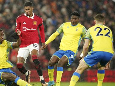 Manchester United sukses mengalahkan Nottingham Forest dalam laga Premier League 2022/2023 pekan ke-17, Rabu (28/12/2022). (AP Photo/Dave Thompson)