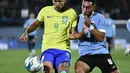 <p>Uruguay berhasil meraih kemenangan dengan skor 2-0 atas Brasil. (AP Photo/Santiago Mazzarovich)</p>