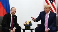 Donald Trump bertemu Vladimir Putin dalam KTT G20 (AFP Photo)