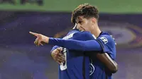 Pemain Chelsea, Kai Havertz, melakukan selebrasi usai mencetak gol ke gawang Barnsley pada laga Piala Liga Inggris di Stadion Stamford Bridge, Kamis (24/9/2020). Chelsea menang dengan skor 6-0. (AP Photo/Neil Hall)