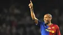 Barcelona's French forward Thierry Henry celebrates a goal against Valencia during their Spanish League match on December 6, 2008 at Camp Nou stadium in Barcelona. AFP PHOTO/LLUIS GENE