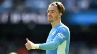 Jack Grealish tetap menjadi rekrutan termahal di bursa transfer musim panas 2021/2022 usai kepindahannya dari Aston Villa ke Manchester City. Harry Kane yang digadang-gadang akan melampaui nilai transfer Jack Grealish nyatanya tetap berseragam Tottenham. (Foto: AFP/Oli Scarff)