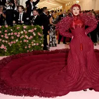Cardi B mengenakan gaun panjang merah saat menghadiri Met Gala 2019 bertema Camp: Notes on Fashion di The Metropolitan Museum of Art, New York, Amerika Serikat, Senin (6/5/2019). (Photo by Evan Agostini/Invision/AP)