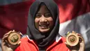 Diananda Choirunisa atlet panahan putri Indonesia berhasil meraih medali emas nomor recurve  pada SEA Games 2017 di Kuala Lumpur, Malaysia lalu. (Bola.com/Peksi Cahyo)