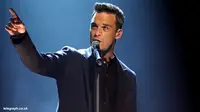 Robbie Williams Ingin Pensiun dari Take That