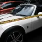 Mobil sport Mazda MX-5 hasil penyitaan barang dari kasus dugaan penipuan, penggelapan dan TPPU Pandawa Group di Polda Metro, Jakarta, Kamis (9/3). Polda Metro Jaya menyita 22 unit mobil, 20 unit motor bos Pandawa Group. (Liputan6.com/Yoppy Renato)