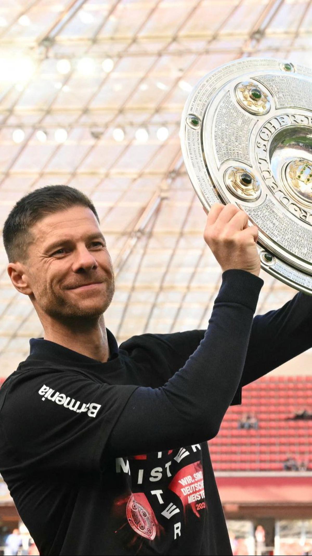 Tak hanya itu, Xabi Alonso juga mencetak sejarah karena Bayer Leverkusen tampil tanpa kekalahan sepanjang musim ini.&nbsp;Foto: Ina Fessbender/AFP