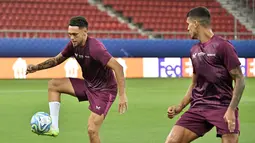 Manchester City dan Sevilla akan saling berhadapan dengan status sebagai juara di masing-masing kompetisi, pada pertandingan Piala Super Eropa. (Louisa GOULIAMAKI / AFP)