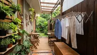 7 Desain Rumah dengan Area Jemur yang Tersembunyi di Balik Kebun, Rapi dan Tetap Privat