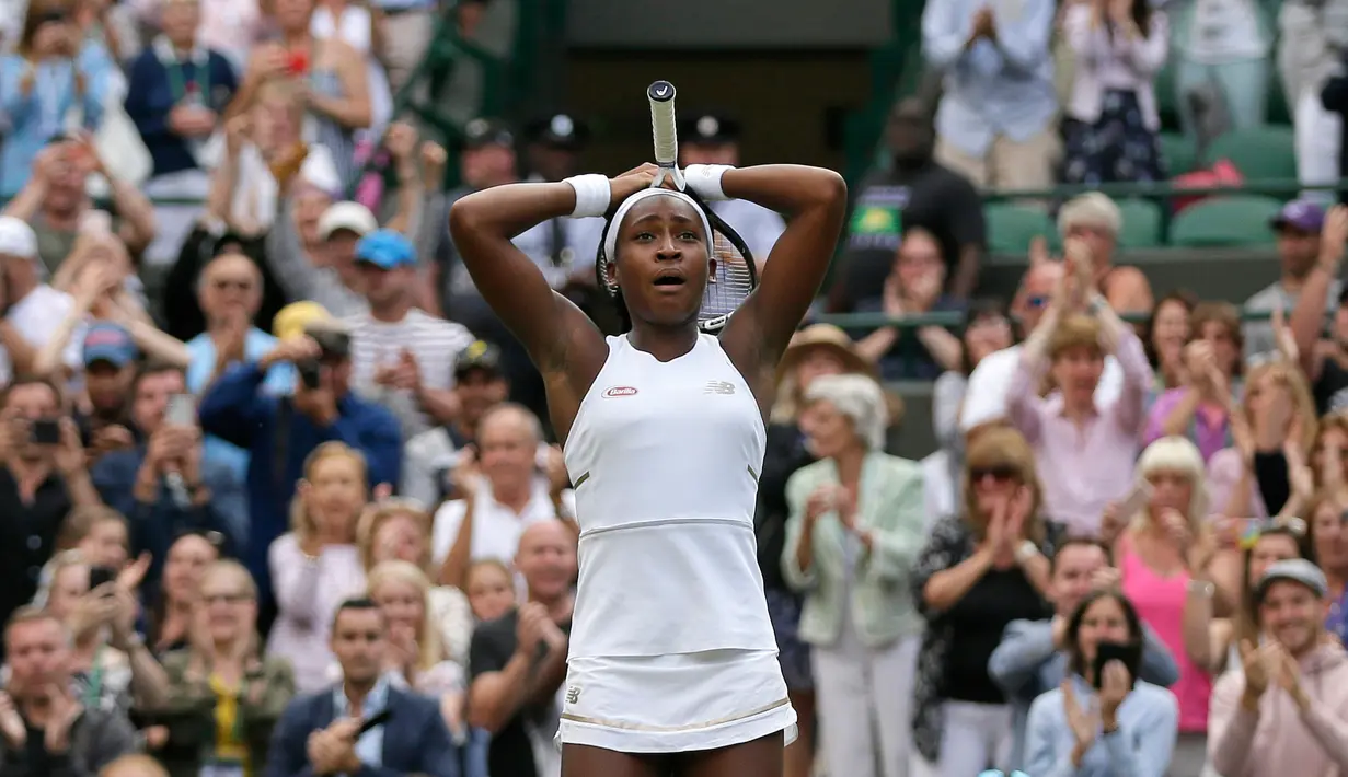 Ekspresi petenis Cori Gauff usai berhasil mengalahkan Venus Williams selama pertandingan babak pertama Grand Slam Wimbledon di London (1/7/2019). Cori Gauff mengalahkan Venus Williams 6-4 6-4. (AP Photo/Tim Ireland)