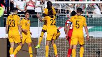 Timnas Australia menang 3-0 atas Palestina pada laga kedua Grup B Piala AFC 2019, di Rashid Stadium, Dubai, Jumat (11/1/2019). (AFP/Karim Sahib)