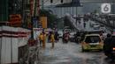 Kendaraan bermotor melintasi genangan air di ruas Tol Dalam Kota (Dalkot), Jakarta, Selasa (17/12/2019). Air hujan sempat menggenangi sebagian ruas Tol Dalam Kota  untuk arah Kuningan arah Cawang hingga sempat membuat lalu lintas tersendat. (Liputan6.com/Faizal Fanani)