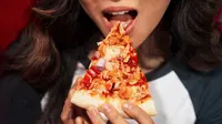 5 Surprising Side Effects of Eating Too Much Pizza