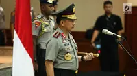 Kapolri Jenderal Tito Karnavian memimpin upacara kenaikan pangkat 14 perwira tinggi Polri di Rupatama Mabes Polri, Jakarta, Jumat (21/7). Mereka adalah pejabat di Kepolisian RI, Lembaga Pertahanan Nasional (Lemhannas) dan BIN. (Liputan6.com/Faizal Fanani)