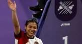 Pebulutangkis tunggal putri Indonesia, Gregoria Mariska Tunjung merayakan kemenangan atas Ratchanok Intanon dari Thailand dalam pertandingan perempat final bulu tangkis tunggal putri selama Olimpiade Paris 2024 di Porte de la Chapelle Arena, Paris, 3 Agustus 2024. (Luis TATO/AFP)