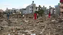 Diketahui sedikitnya 218 orang tewas dan 27 lainnya masih hilang dalam bencana banjir monsun dan tanah longsor di seluruh wilayah Nepal. (Prakash MATHEMA/AFP)