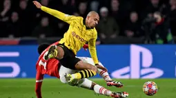 Duel kedua tim berlangsung imbang dengan skor akhir 1-1. (JOHN THYS/AFP)