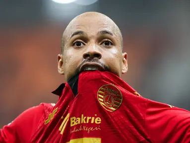 Pemain Persija Jakarta, Gustavo Almeida, melakukan selebrasi setelah mencetak gol ke gawang Bali United pada laga BRI Liga 1 di Stadion Jakarta International Stadium (JIS), Jakarta, Sabtu (10/5/2025) malam WIB. (Bola.com/Abdul Aziz)