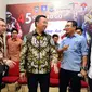 Menpora, Imam Nahrawi (tengah) berbincang dengan Ketua PP IMI, Sadikin Aksa usai memberi keterangan terkait ajang MXGP 2017 di Jakarta, Rabu (18/1). Ajang MXGP 2017 akan digelar di kota Pangkal Pinang, 4-5 Maret. (Liputan6.com/Helmi Fithriansyah)